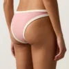 Figi bikini o średnim pokryciu z kontrastową lamówką i wycięciem w kształcie litery U Figi bikini o średnim pokryciu z kontrastową lamówką i wycięciem w kształcie litery U