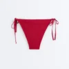 Figi bikini o średnim stopniu zakrycia z wiązaniem