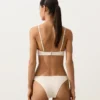 Figi Bikini o średnim stopniu zakrycia z wycięciem w kształcie litery U i fakturą bąbelkową