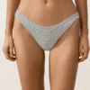 Figi bikini o średnim stopniu zakrycia z wycięciem w kształcie litery U z tkaniny żakardowej w groszki Figi bikini o średnim stopniu zakrycia z wycięciem w kształcie litery U z tkaniny żakardowej w groszki