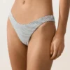 Figi bikini o średnim stopniu zakrycia z wycięciem w kształcie litery U z tkaniny żakardowej w groszki Figi bikini o średnim stopniu zakrycia z wycięciem w kształcie litery U z tkaniny żakardowej w groszki