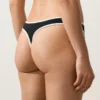 Fioletowe majtki bikini typu stringi z kontrastową lamówką Fioletowe majtki bikini typu stringi z kontrastową lamówką