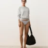 Klasyczne majtki bikini z żakardowym wzorem w groszki Klasyczne majtki bikini z żakardowym wzorem w groszki