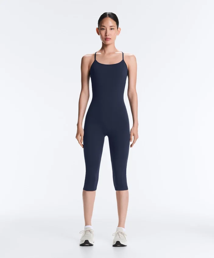 Kombinezon Comfortlux Capri z krzyżującymi się ramiączkami z tyłu Kombinezon Comfortlux Capri z krzyżującymi się ramiączkami z tyłu