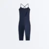 Kombinezon Comfortlux Capri z krzyżującymi się ramiączkami z tyłu Kombinezon Comfortlux Capri z krzyżującymi się ramiączkami z tyłu
