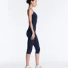 Kombinezon Comfortlux Capri z krzyżującymi się ramiączkami z tyłu Kombinezon Comfortlux Capri z krzyżującymi się ramiączkami z tyłu
