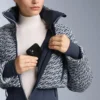 Kombinezon narciarski Minardi Piume, wodoodporny, z wypełnieniem typu twist, 80% puchu i 20% pierza Kombinezon narciarski Minardi Piume, wodoodporny, z wypełnieniem typu twist, 80% puchu i 20% pierza