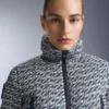 Kombinezon narciarski Minardi Piume, wodoodporny, z wypełnieniem typu twist, 80% puchu i 20% pierza Kombinezon narciarski Minardi Piume, wodoodporny, z wypełnieniem typu twist, 80% puchu i 20% pierza