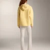 Kurtka z imitacji kożucha z kapturem Kurtka z imitacji kożucha z kapturem