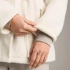 Kurtka z imitacji kożucha z regulowaną talią Kurtka z imitacji kożucha z regulowaną talią