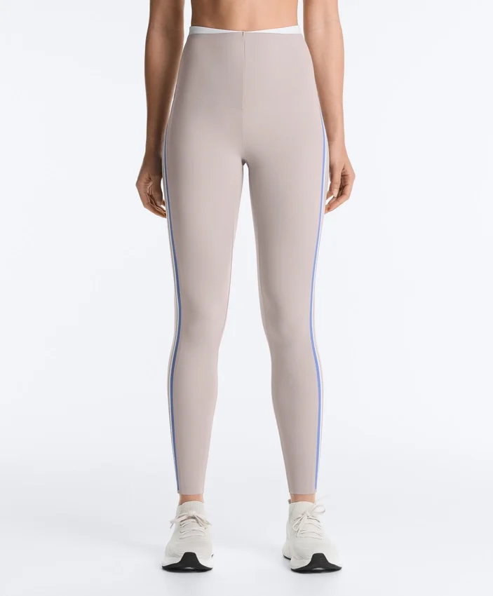 Legginsy kompresyjne z wysokim stanem i kontrastowymi wykończeniami, sięgające do kostek Legginsy kompresyjne z wysokim stanem i kontrastowymi wykończeniami, sięgające do kostek