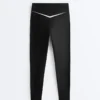 Legginsy Perfect-Adapt z wysokim stanem i długością do kostek, z kontrastowymi detalami