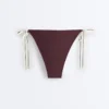 Majtki bikini o średnim stopniu zakrycia z wiązaniem