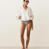 Majtki bikini o średnim stopniu zakrycia z wiązaniem, z teksturowanego materiału w paski