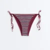 Majtki bikini o średnim stopniu zakrycia z wiązaniem, z teksturowanego materiału w paski