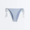 Majtki bikini o średnim stopniu zakrycia z wiązaniem, z teksturowanego materiału w paski