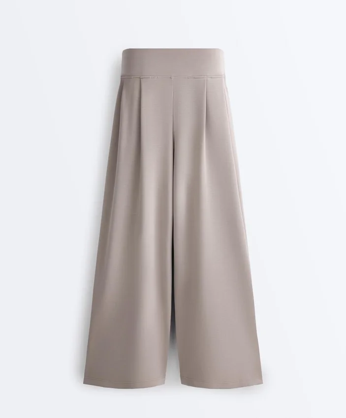 Miękkie w dotyku spodnie z modalu z szerokimi nogawkami i detalem w stylu gorsetu Miękkie w dotyku spodnie z modalu z szerokimi nogawkami i detalem w stylu gorsetu