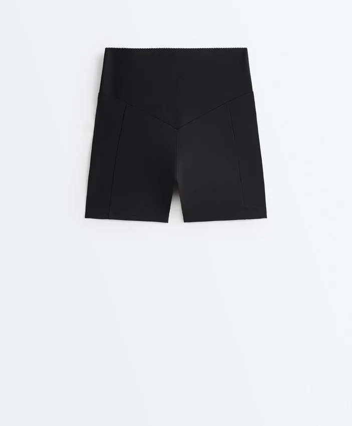 Spodnie typu hot pants z wysokim stanem i kieszenią Compressive o długości 10 cm Spodnie typu hot pants z wysokim stanem i kieszenią Compressive o długości 10 cm