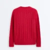 Swetr z dzianiny typu cable knit z dekoltem w serek, wykonany w 100% z bawełny