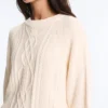 Swetry z dzianiny typu cable knit, 100% bawełna