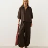 Szorty polo oversize z krótkim rękawem, wykonane w 100% z lnu Szorty polo oversize z krótkim rękawem, wykonane w 100% z lnu