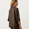 Szorty polo oversize z krótkim rękawem, wykonane w 100% z lnu Szorty polo oversize z krótkim rękawem, wykonane w 100% z lnu