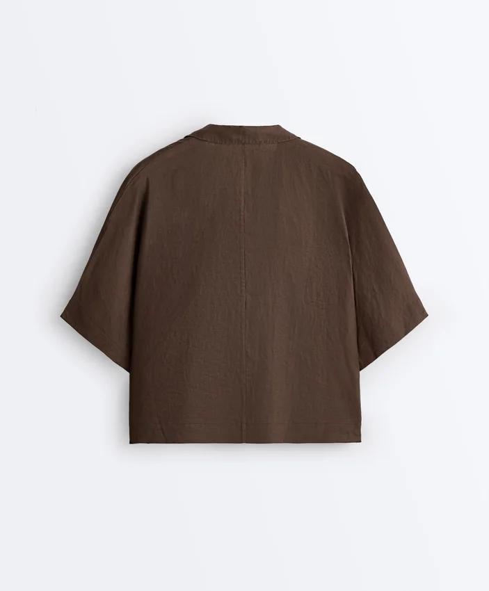 Szorty polo oversize z krótkim rękawem, wykonane w 100% z lnu Szorty polo oversize z krótkim rękawem, wykonane w 100% z lnu
